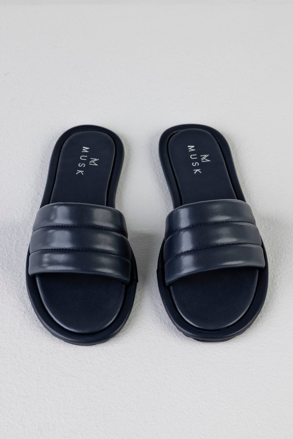 Quilted flat sole slide sandals