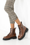 Lace-up boots with buckle