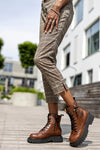 Lace-up boots with buckle