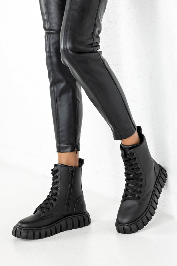 Lace up sneaker boots